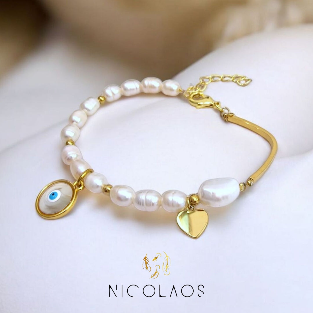 Χειροποίητο βραχιόλι "Zelando" με πραγματικά λευκά μαργαριτάρια ποικιλίας baroque και μεταλλικά μέρη από ανοξείδωτο ατσάλι