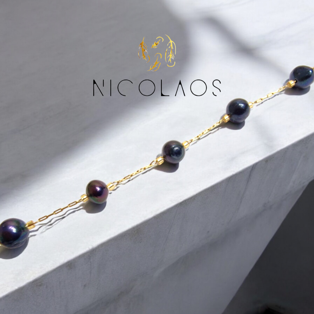 Χειροποίητο βραχιόλι 'Sicilia Nera' από ανοξείδωτο ατσάλι με πραγματικά μαύρα ακατέργαστα μαργαριτάρια ποικιλίας Baroque