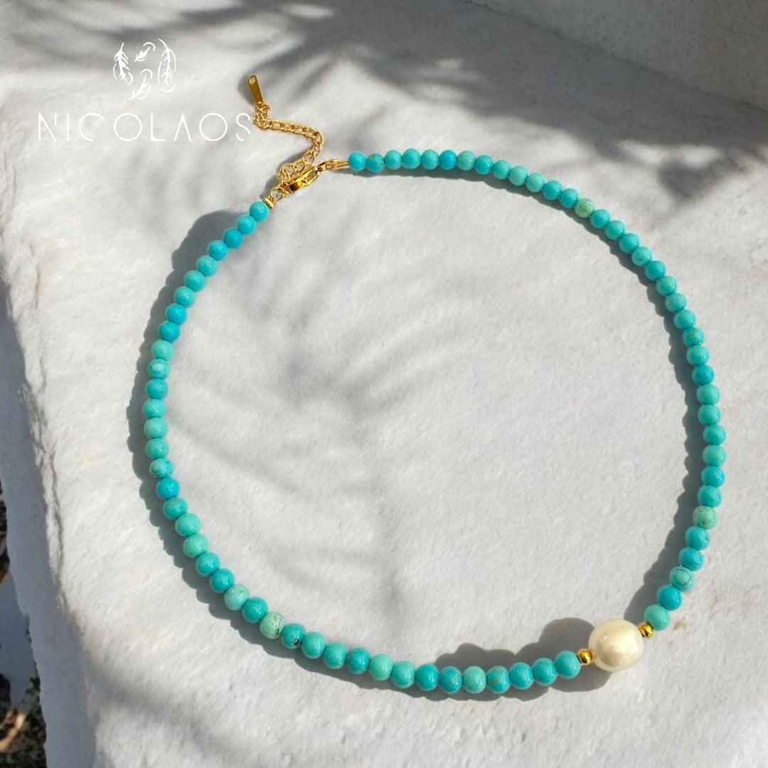Χειροποίητο κολιέ 'Aqua bubbles' με λευκό μαργαριτάρι ποικιλίας Baroque και τυρκουάζ χάντρες φίλντισι