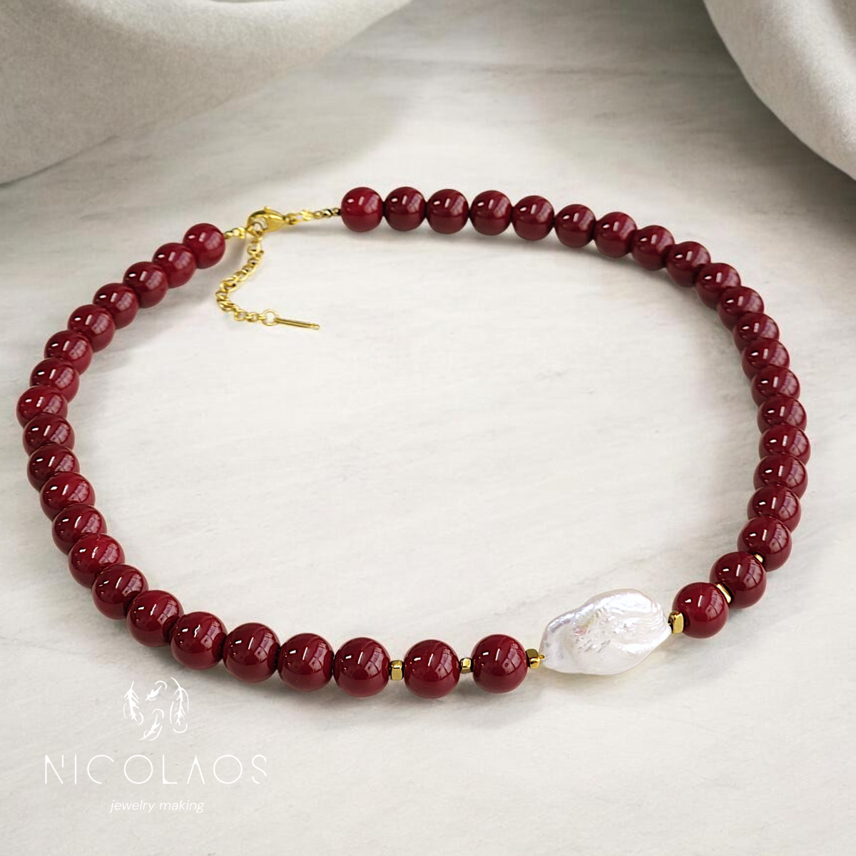 Χειροποίητο κολιέ ' Burgundy shine ' με λίθους Garnet και μεγάλο μαργαριτάρι Baroque