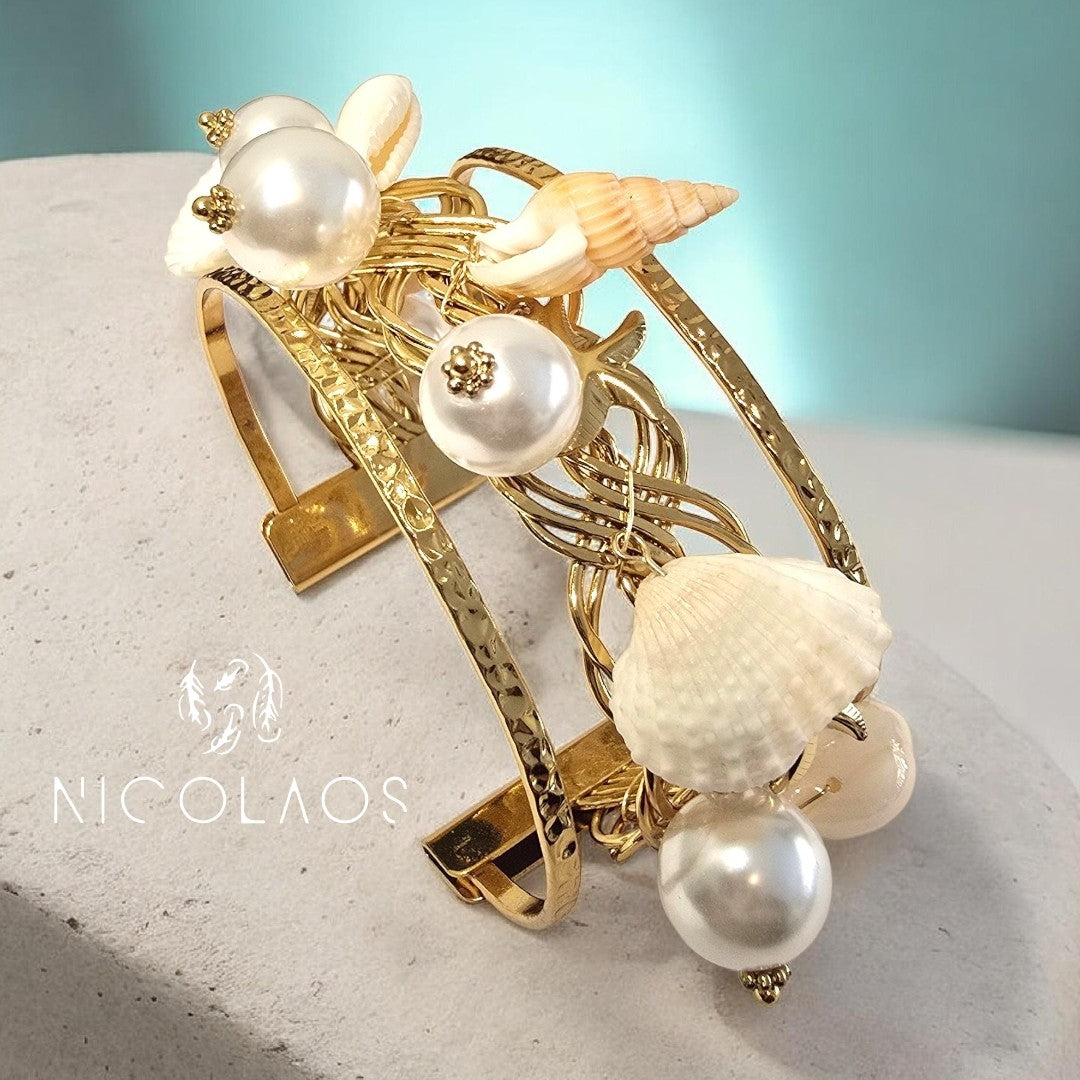 Βραχιόλι 'Sea in love' απο ανοξείδωτο ατσάλι με κρεμαστά Κοχύλια και πέρλες