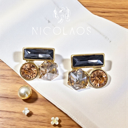 Σκουλαρίκια 'Nodorro' απο ανοξείδωτο ατσάλι με μεγάλα ζιργκόν