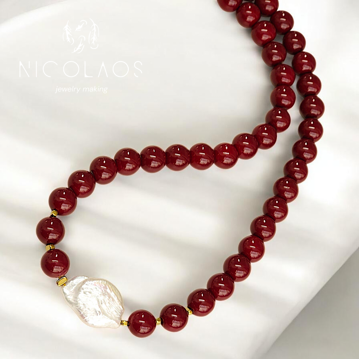 Χειροποίητο κολιέ ' Burgundy shine ' με λίθους Garnet και μεγάλο μαργαριτάρι Baroque