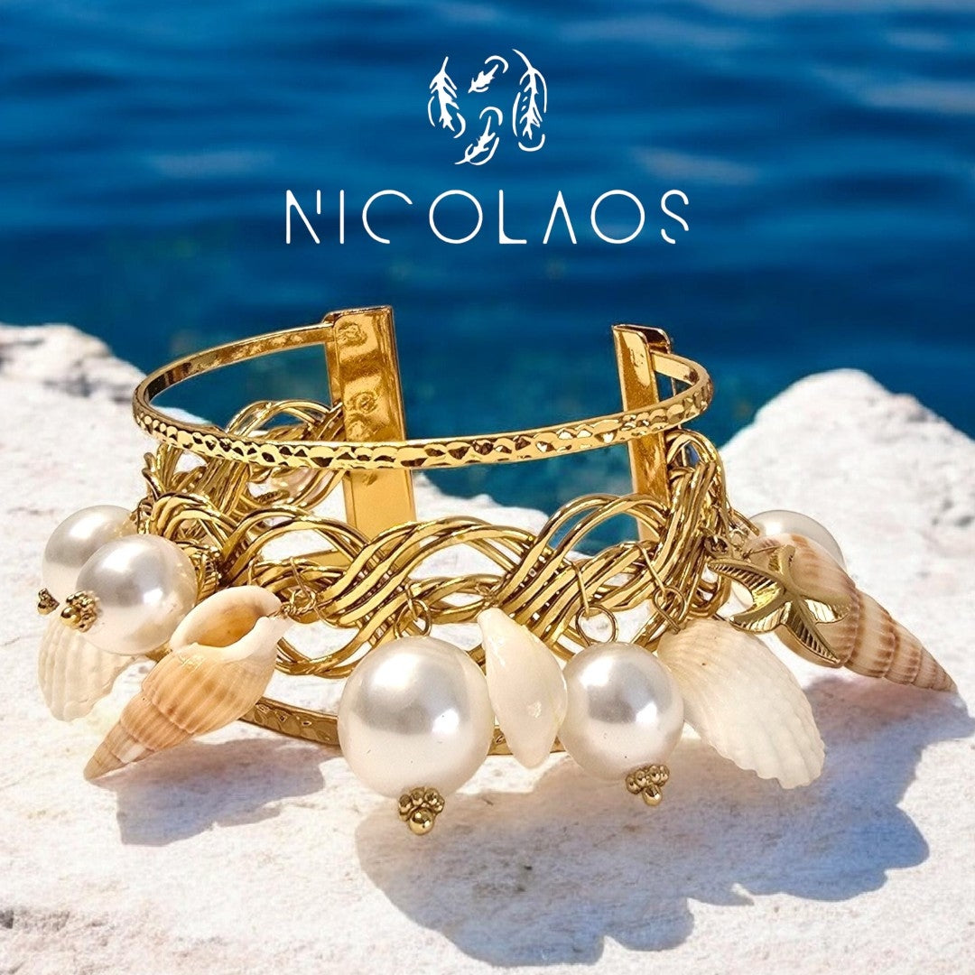 Βραχιόλι 'Sea in love' απο ανοξείδωτο ατσάλι με κρεμαστά Κοχύλια και πέρλες